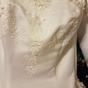 White ballgown with or without bolero.